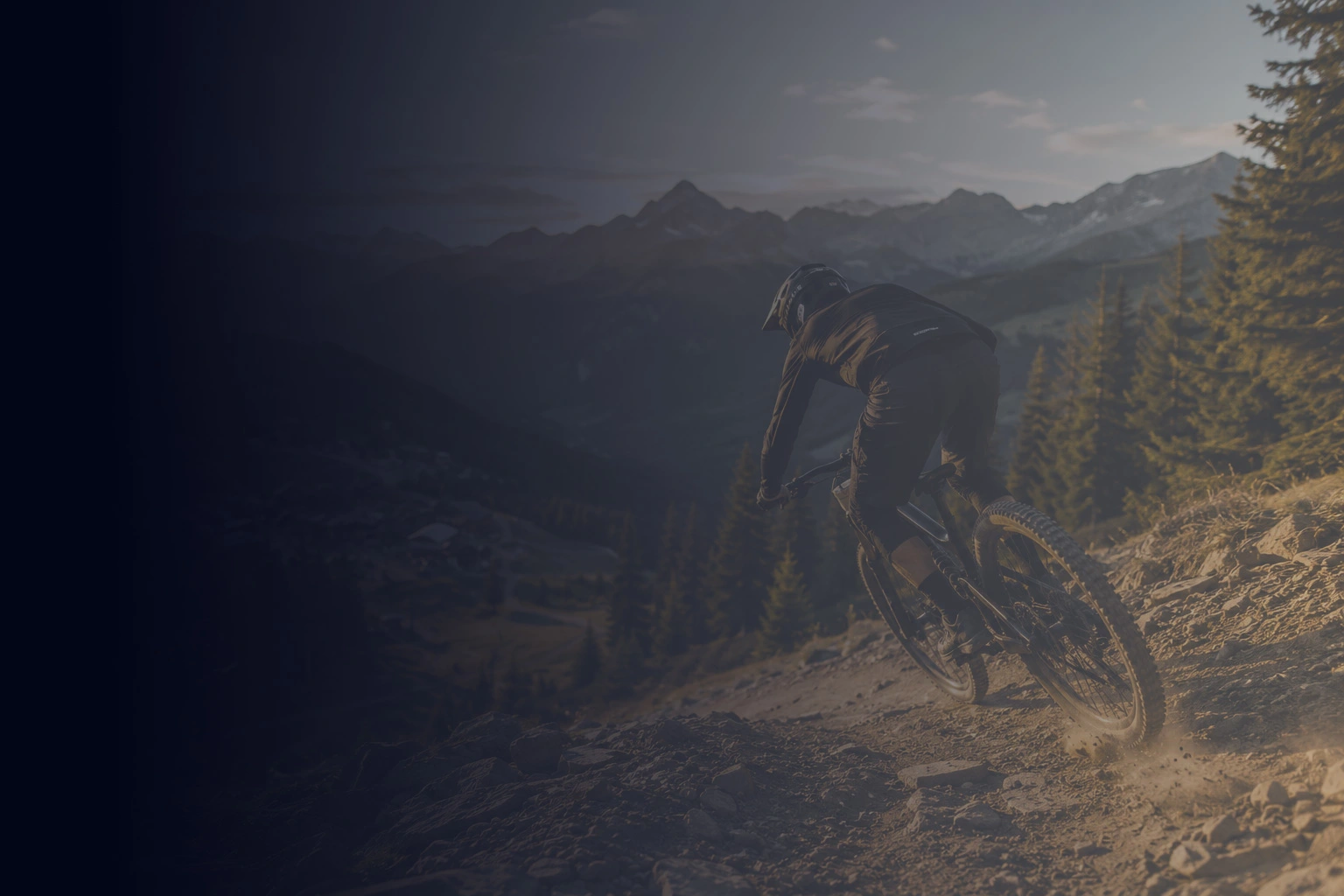 Mountain biker riding through a bike park
